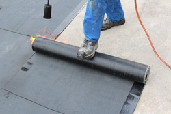 Flat roof repair and installation in Wyoming Residential and commercial flat roofs in MI and IL